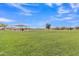 Large grassy park area with playground and volleyball court at 4028 N Ranier --, Mesa, AZ 85215