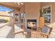 Comfortable patio with fireplace and seating area at 4028 N Ranier --, Mesa, AZ 85215