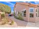 Landscaped side yard with a brick pathway at 4028 N Ranier --, Mesa, AZ 85215