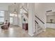 Open staircase with hardwood steps and a light-colored railing at 4028 N Ranier --, Mesa, AZ 85215