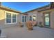 Inviting outdoor patio featuring comfortable seating and views of the home's rear exterior at 4053 E Zion Way, Chandler, AZ 85249