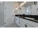 Bathroom showcasing a double sink vanity with black hardware and bright vanity lighting at 4053 E Zion Way, Chandler, AZ 85249