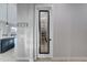 View of the pantry through a door with decorative glass panels and a black handle at 4053 E Zion Way, Chandler, AZ 85249