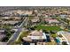 Aerial view of a luxury home with a pool and beautifully landscaped yard in a quiet neighborhood at 4330 E Gemini Pl, Chandler, AZ 85249