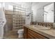 Elegant bathroom with glass block shower, modern vanity, and neutral tones at 4330 E Gemini Pl, Chandler, AZ 85249