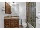 Bathroom with wood vanity and walk-in shower at 4330 E Gemini Pl, Chandler, AZ 85249