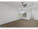 Bright bedroom with plush carpeting and plantation shutters at 4330 E Gemini Pl, Chandler, AZ 85249