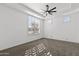 Spacious bedroom with ceiling fan and neutral tones at 4330 E Gemini Pl, Chandler, AZ 85249