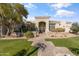 Stunning curb appeal with a brick walkway and lush landscaping at 4330 E Gemini Pl, Chandler, AZ 85249