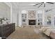 Main bedroom featuring a fireplace and built-in shelving at 4330 E Gemini Pl, Chandler, AZ 85249