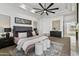 Serene main bedroom with plush bedding and fireplace at 4330 E Gemini Pl, Chandler, AZ 85249