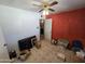 Simple bedroom with ceiling fan and tiled floors at 4411 N 56Th Dr, Phoenix, AZ 85031