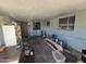 Enclosed patio with various storage items at 4411 N 56Th Dr, Phoenix, AZ 85031