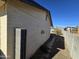 Side of the house with a walkway and block wall at 4411 N 56Th Dr, Phoenix, AZ 85031