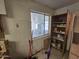 Kitchen area with wooden cabinets and a window at 4411 N 56Th Dr, Phoenix, AZ 85031