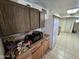 Kitchen with wood cabinets and microwave at 4411 N 56Th Dr, Phoenix, AZ 85031