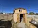 Small wooden shed with open doors at 4411 N 56Th Dr, Phoenix, AZ 85031