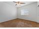 Spacious bedroom with brown carpet and ceiling fan at 45354 W Horse Mesa Rd, Maricopa, AZ 85139