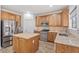 Kitchen with stainless steel appliances and wooden cabinets at 45354 W Horse Mesa Rd, Maricopa, AZ 85139