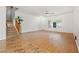 Spacious living room with wood-look floors and a staircase at 45354 W Horse Mesa Rd, Maricopa, AZ 85139