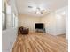 Bright living room with hardwood floors and a ceiling fan at 45354 W Horse Mesa Rd, Maricopa, AZ 85139