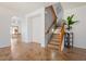 Wooden staircase with a modern railing at 45354 W Horse Mesa Rd, Maricopa, AZ 85139