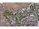 Aerial view of the property highlighting its location near the golf course, resort, and desert landscape at 4575 N Phoenician Blvd # 2, Scottsdale, AZ 85251