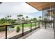 Outdoor balcony with wrought iron railing provides a lovely spot to admire the beautiful water views at 4575 N Phoenician Blvd # 2, Scottsdale, AZ 85251