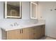 Bathroom featuring double vanity with ample storage and illuminated mirrors at 4575 N Phoenician Blvd # 2, Scottsdale, AZ 85251