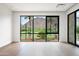 Bright living room with scenic views, large windows, and hardwood floors at 4575 N Phoenician Blvd # 2, Scottsdale, AZ 85251