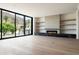 Spacious living room boasts a fireplace, built-in shelving, and large windows with scenic views at 4575 N Phoenician Blvd # 4, Scottsdale, AZ 85251