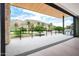 Spacious outdoor patio area with a built-in grill and panoramic views of the golf course and mountains at 4575 N Phoenician Blvd # 4, Scottsdale, AZ 85251