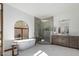 Spa-like bathroom featuring a soaking tub and a walk-in shower at 4920 E Beryl Ave, Paradise Valley, AZ 85253