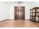 Bright entryway with double doors and tile flooring at 4920 E Beryl Ave, Paradise Valley, AZ 85253