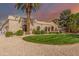 Single story home with circular driveway and lush landscaping at 4920 E Beryl Ave, Paradise Valley, AZ 85253