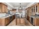 Spacious kitchen with granite countertops and wooden cabinetry at 4920 E Beryl Ave, Paradise Valley, AZ 85253