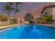 Stunning pool reflecting the beautiful sunset sky at 4920 E Beryl Ave, Paradise Valley, AZ 85253