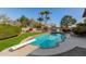 Inviting kidney shaped pool with diving board at 4920 E Beryl Ave, Paradise Valley, AZ 85253