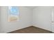 Well-lit bedroom featuring a large window and closet at 5132 E Umber Rd, San Tan Valley, AZ 85143