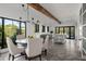 Kitchen dining area with round table and white chairs at 5328 N 46Th St, Phoenix, AZ 85018