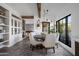 Casual dining area with round table and white chairs near kitchen at 5328 N 46Th St, Phoenix, AZ 85018