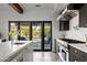 Modern kitchen with stainless steel appliances and an island at 5328 N 46Th St, Phoenix, AZ 85018