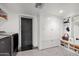 Laundry room with washer, dryer, storage cabinets, and patterned floor at 5328 N 46Th St, Phoenix, AZ 85018