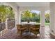 Relaxing patio with round table and wicker chairs, overlooking the backyard at 5328 N 46Th St, Phoenix, AZ 85018