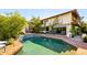 Inviting pool area with brick decking and lush landscaping at 5328 N 46Th St, Phoenix, AZ 85018