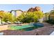 Hexagonal pool with brick decking and mountain views at 5328 N 46Th St, Phoenix, AZ 85018