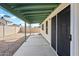 Covered patio with sliding glass door to house at 5415 N 79Th Dr, Glendale, AZ 85303