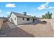 Back exterior view showing house, yard, and fence at 5415 N 79Th Dr, Glendale, AZ 85303