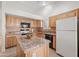 Kitchen features granite island and stainless steel appliances at 5415 N 79Th Dr, Glendale, AZ 85303