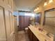 Clean bathroom with shower/tub combo and vanity at 5744 W Siesta Way, Laveen, AZ 85339